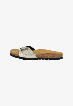 Slide sandal with a metallic silver textured strap, adjustable buckle, cork footbed, and black rubber sole.