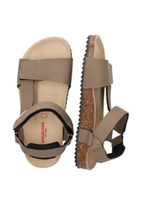 Bruine leren sandalen met twee verstelbare banden, kurken voetbed, geribbelde buitenzool en een plat ontwerp. Inclusief merklogo op de binnenzool.