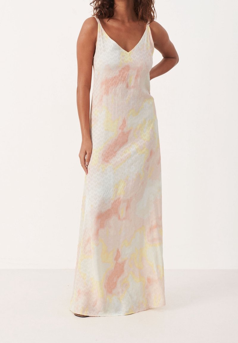 Robe longue avec col en V, en tissu léger présentant un motif abstrait pastel en rose, jaune et blanc, avec de fines bretelles spaghetti.