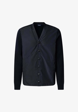 Chaqueta negra con un frente de cuello y botones, con un cuerpo acolchado y mangas de punto, que combina texturas elegantes y un diseño moderno.