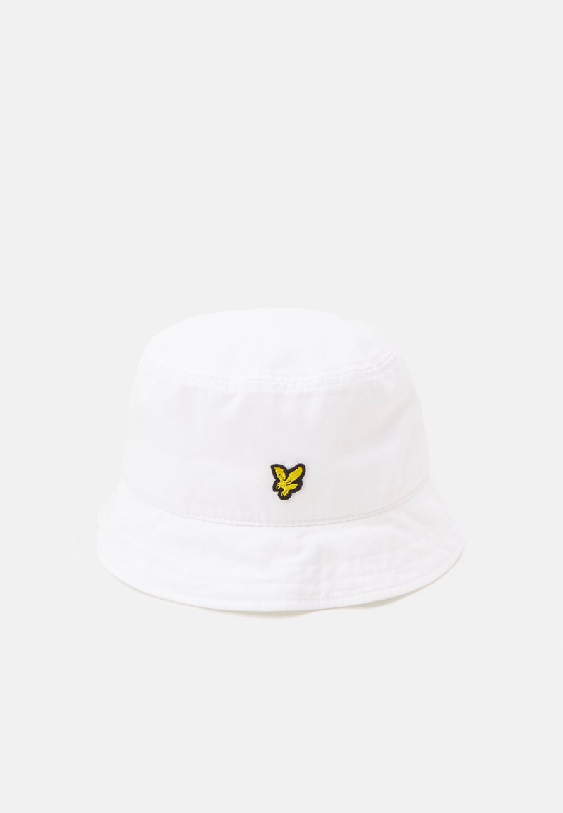White cotton bucket hat featuring a black and yellow embroidered logo on the front, with a soft texture and curved brim.