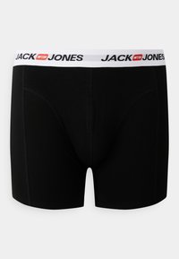 Schwarze Boxershorts aus weichem Stoff. Mit einem weißen elastischen Bund mit schwarzem Logo-Text. Klassisches, figurnahes Design.