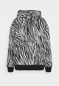Sudadera de cuello con capucha que presenta un patrón de rayas de cebra en blanco y negro, tejido suave al tacto y un dobladillo ribeteado negro.