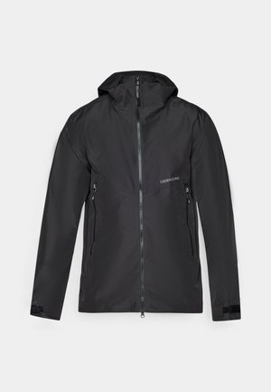 Giacca nera impermeabile con cappuccio, zip frontale completa e due tasche laterali con zip. Texture liscia con polsini in velcro.