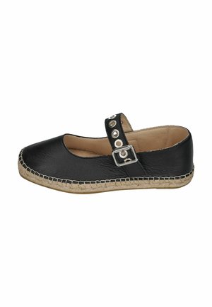Black leather flat shoe with beige woven sole, Mary Jane strap featuring silver buckle and metal eyelets.