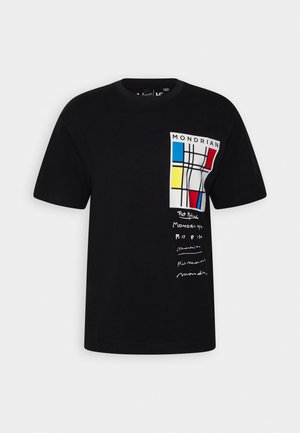 Black short-sleeve t-shirt with colorful Mondrian-style geometric print and white handwritten text on the left chest area.