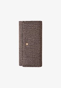 Ausgewählt, op natural black