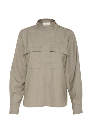 Ljusgrå blus i texturerad tyg, med ståkrage, två framfickor och guldknappdetaljer på axeln.
