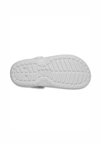 Witte Crocs outsole met een gestructureerd oppervlak, voorzien van een loopvlakpatroon voor grip, afgeronde randen en het merkembleem in het midden.