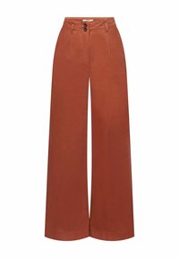 Pantalon à jambes larges de couleur orange rouille, fabriqué en tissu léger. Il présente une taille haute, deux poches avant et une fermeture à double bouton.