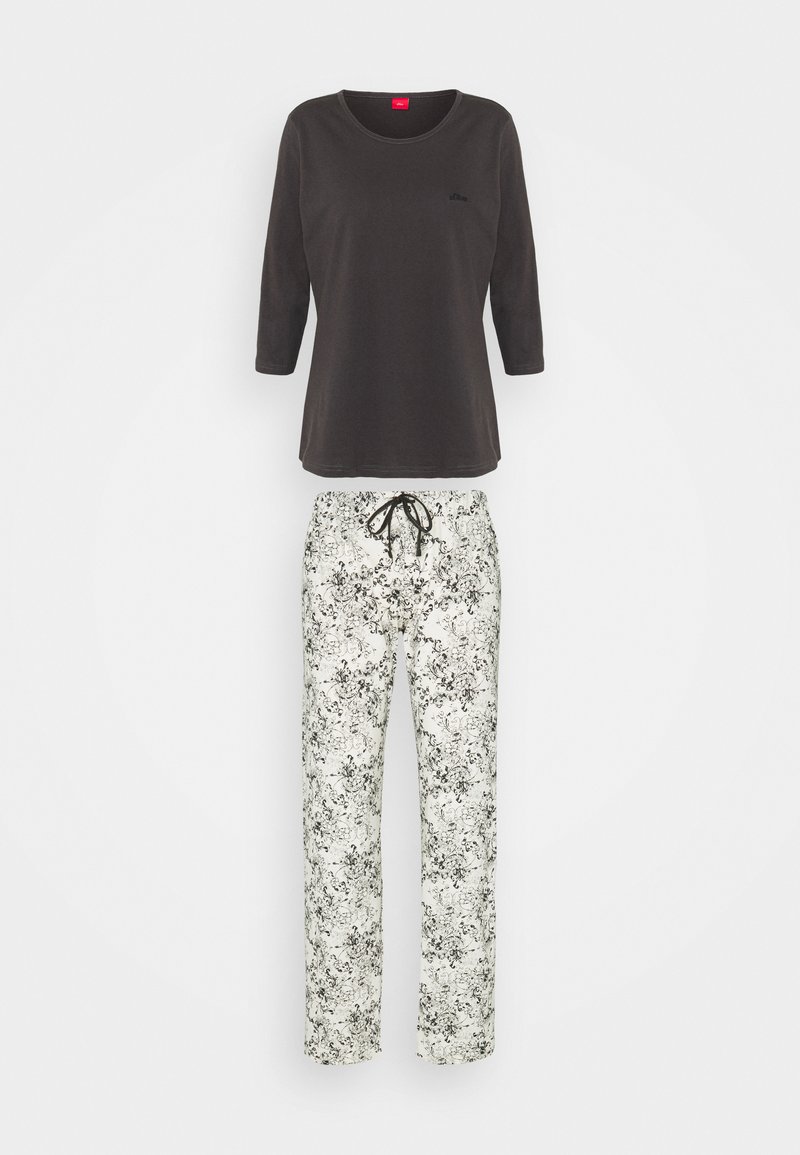 Dunkelgraues Langarmoberteil kombiniert mit weißen Hosen, die ein florales schwarzes Design aufweisen. Die Hosen haben einen Kordelzugbund und einen lockeren Schnitt.