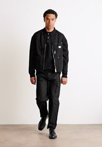 HUGO LUNUS - Γιλέκο - black