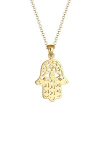 Goldene Halskette mit einem ausgeschnittenen Hamsa-Hand-Anhänger, der mit kunstvollen Mustern und einem Augensymbol verziert ist. Die Kette ist schlicht und verknüpft.