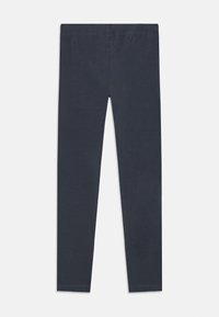 Leggings grigio scuro realizzati in un tessuto morbido ed elastico. Presentano una vita elasticizzata e un design attillato, senza motivi visibili né componenti metallici.