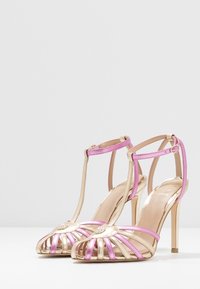 Guess Sandales à talons hauts - gold-coloured