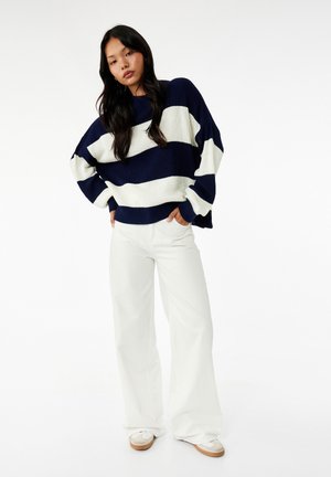 - Sweter