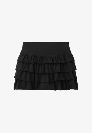Minigonna nera a balze a più livelli con ampia vita, caratterizzata da più balze in tessuto sovrapposte per volume e texture.