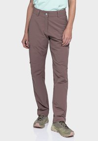 Leichte, gut sitzende Hosen in verschwommenem Rosaton, aus synthetischem Material. Mit einem Reißverschluss vorne, seitlichen Taschen und einer glatten Oberfläche.