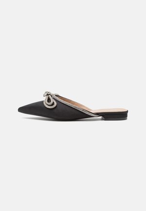 Black satin pointed-toe slip-on shoes featuring a silver embellishment and shiny accents along the edge, with a low, flat heel.
