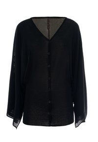Cardigan nero a maglia aperta con scollatura a V, sette bottoni sul davanti e maniche lunghe. Il tessuto sembra leggero e trasparente.