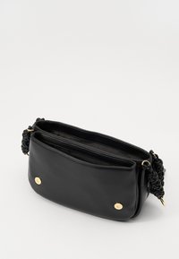 Black leather crossbody bag with a braided handle, gold hardware accents, and two compartments. Smooth texture and rectangular shape.