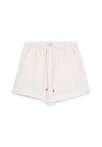 Shorts beige clair en tissu doux, avec une ceinture élastique, un cordon de serrage, deux poches latérales et des détails de ourlet replié.