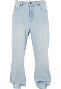 Jeans de denim azul claro sueltos con una cintura alta, cinco pockets, cierre de botón y piernas de pantalón anchas, ligeramente arrugadas.
