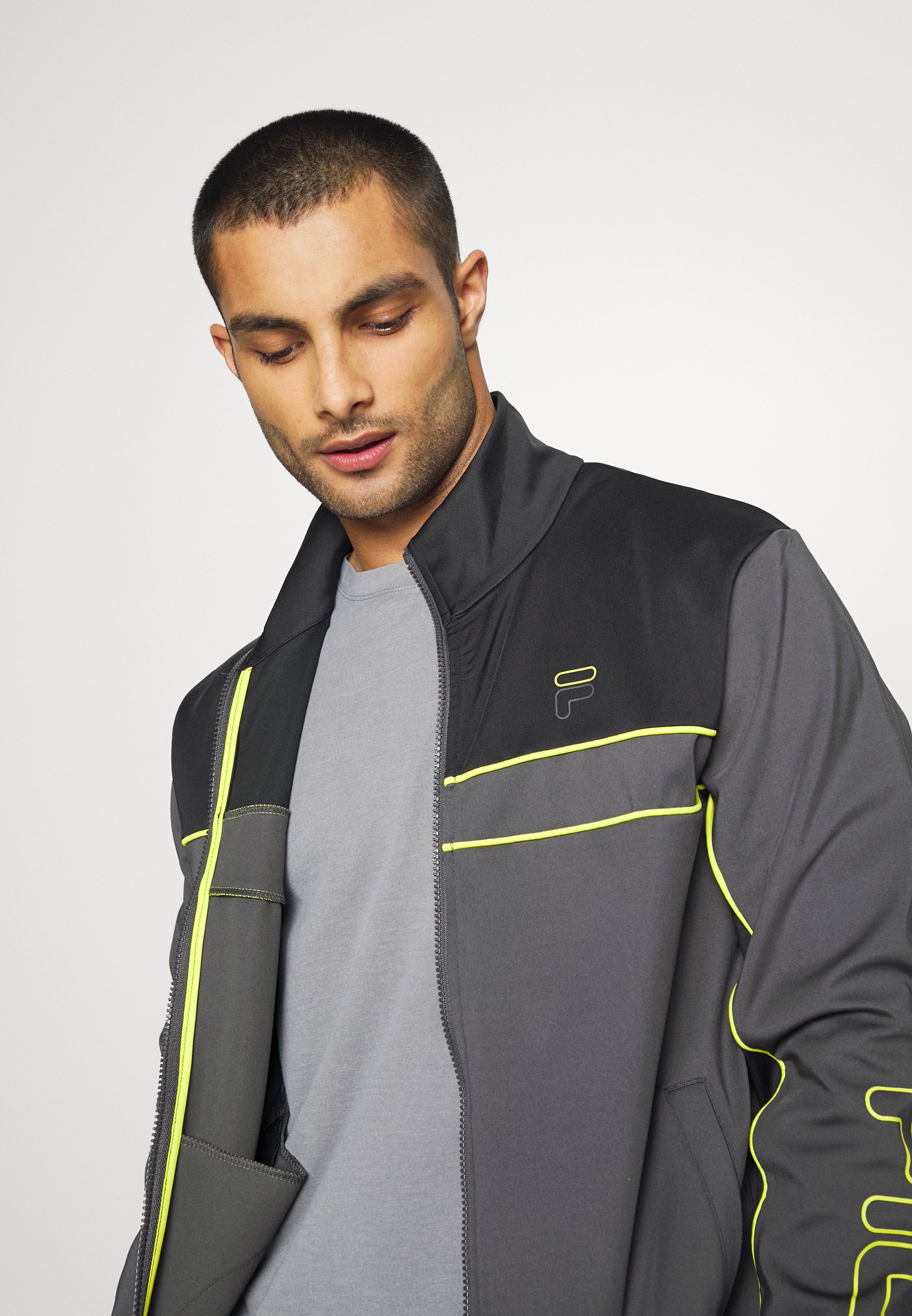 grey fila jacket