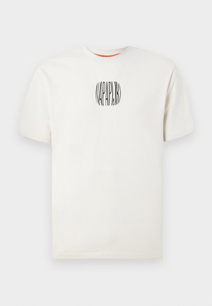 Cream-colored cotton t-shirt with short sleeves, featuring a curved black logo design on the chest. Round neckline, soft texture.