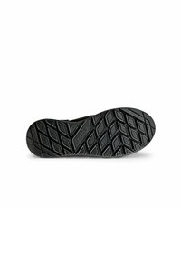 Suola di scarpa in gomma nera con un motivo a diamante testurizzato per una migliore aderenza, dal profilo piatto e bordi curvi. Design pulito e minimal.