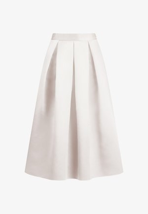 Weißer, hoch taillierter Midirock mit vorne umgekehrten Falten und A-Linien-Silhouette vor einfachem Hintergrund.