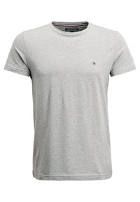 Graues Baumwoll-T-Shirt mit Rundhalsausschnitt, kurzen Ärmeln und kleinem Logodetail auf der linken Brust. Weicher Stoff und klassischer Schnitt.