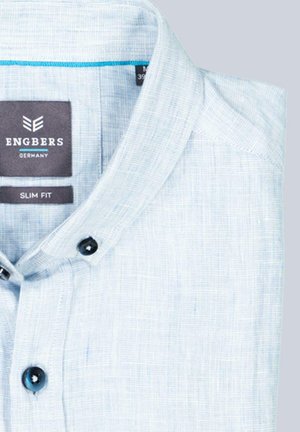 Light blue slim fit shirt with textured fabric, buttoned collar, and Engbers Germany brand label inside the collar.