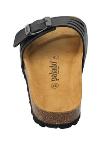 Black sandal with a cork footbed, textured interior, adjustable strap with a metal buckle, and a contoured sole for support.