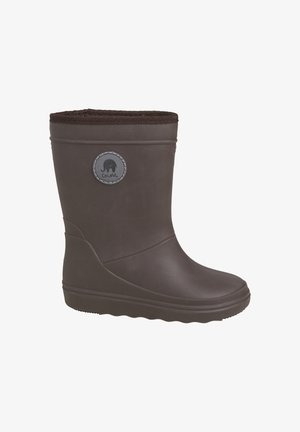 Bota de lluvia de goma marrón con una superficie texturizada, parte superior redondeada y un forro suave de punto. Presenta un logo circular en el lado.