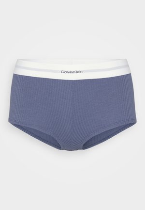Hooggesneden katoenen slip met een zachte blauwe kleur en een geribbeld textuur. Kenmerkt een witte tailleband met grijze strepen en het logo "Calvin Klein".