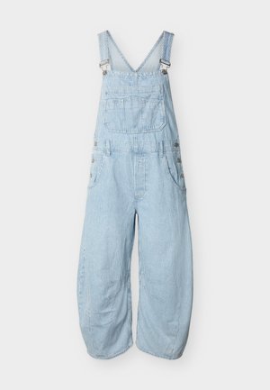 Φαρδιές ολόσωμες φόρμες με ανοιχτό γαλάζιο και άσπρες ρίγες, με ρυθμιζόμενες τιράντες, εμπρόσθια τσέπη στο στήθος, πλαϊνά κουμπιά και εμπρόσθιες τσέπες για τα χέρια.