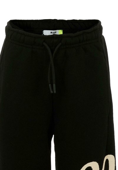 Zwarte katoenen sweatpants met een elastische tailleband, verstelbaar trekkoord en contrasterend beige grafisch detail aan de zijkant.