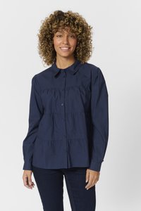 Marineblaue Button-Down-Bluse aus glattem Stoff, mit Kragen und gestuftem Design, langen Ärmeln und subtilen Raffungselementen.