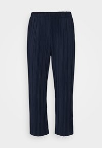 Navy pleated trousers with an elastic waistband, featuring vertical pinstripes and a relaxed fit, ending just above the ankles.