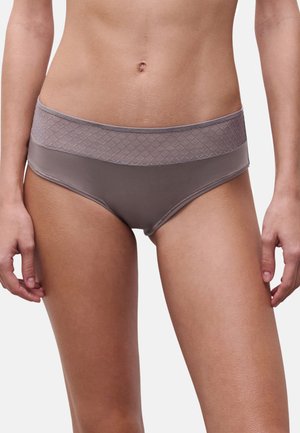 Mid-rise, taupe-colored women's briefs with a textured lace waistband and smooth finish; features a simple, seamless design.