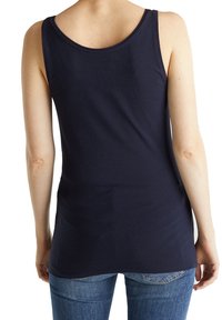 Canotta senza maniche di colore blu navy realizzata in morbido cotone, con scollatura tonda e design posteriore dritto.