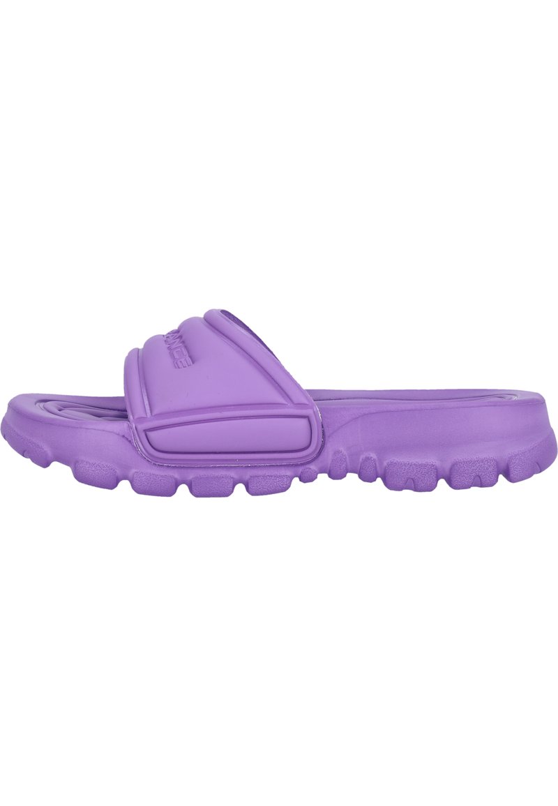 Purple rubber slide sandal with a textured surface, thick strap, and raised detailing across the top. Flat sole with a ridged pattern.