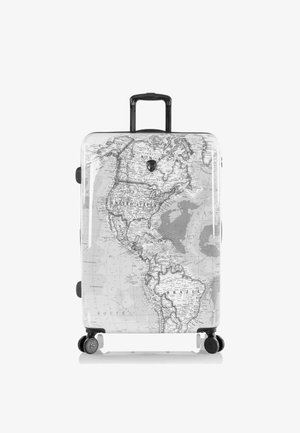 Hartschalentrolley mit einem Schwarz-Weiß-Weltkarten-Design. Verfügt über vier Räder, einen teleskopierbaren Griff und ein Logo auf der Vorderseite.