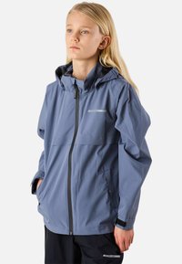 Water-resistant blue jacket with hood, zip front, and elastic cuffs. Features two side pockets and a logo on the chest.