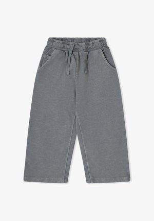 Pantalones grises de pierna ancha con cintura elástica, cordón ajustable y bolsillos laterales, fabricados con tela suave.