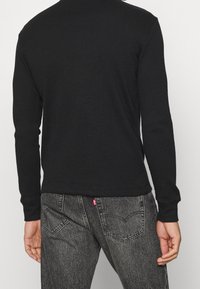 Calvin Klein Jeans Top s dlouhým rukávem - black