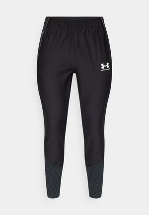 Black athletic pants with an elastic waistband. Features a textured dark gray panel at the lower legs and a white logo on the thigh.