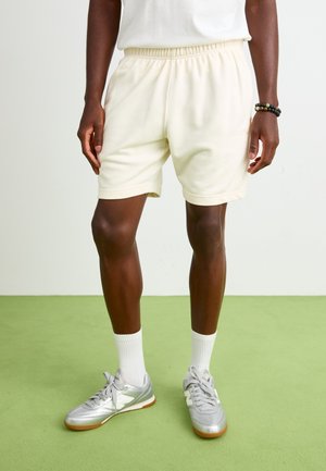 ZANICA - Träningsbyxor - off-white