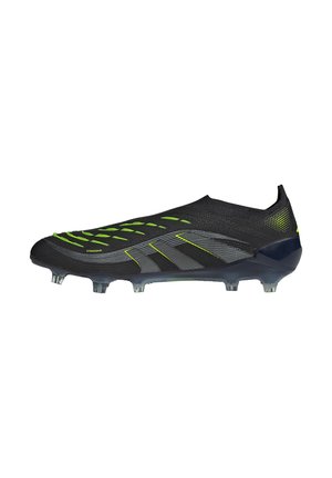 Black and neon green soccer cleat with molded studs, slip-on design, and textured surface for enhanced ball control.